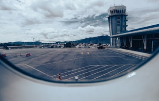 a view of an airport from an airplane window