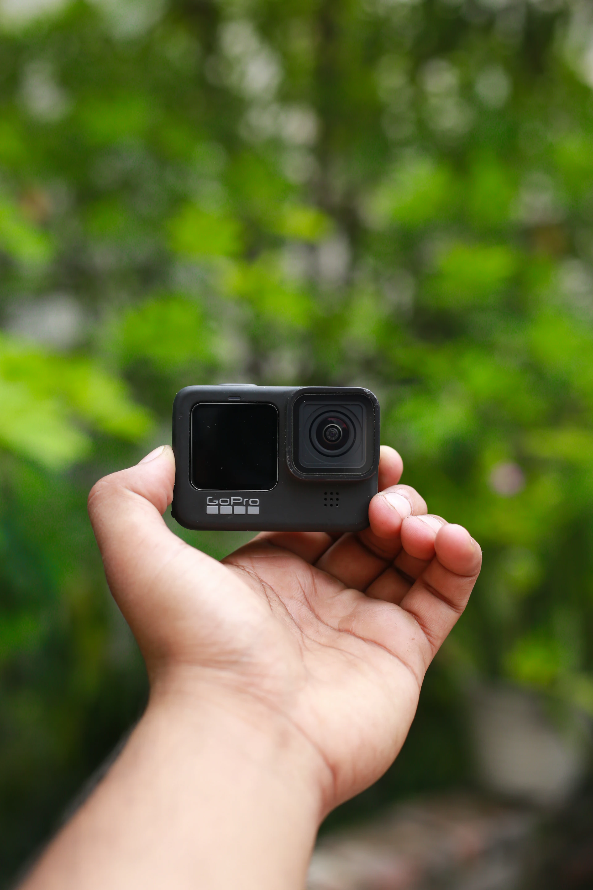 a person holding a camera in their hand