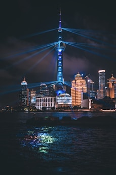 a very tall building with a lot of lights on top of it