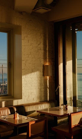 a restaurant with a view of the ocean