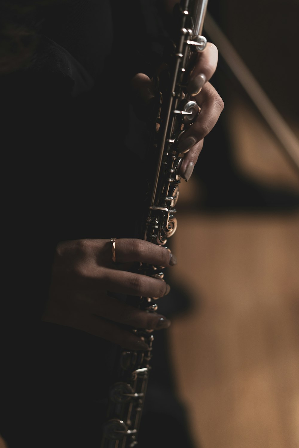 a close up of a person playing a saxophone