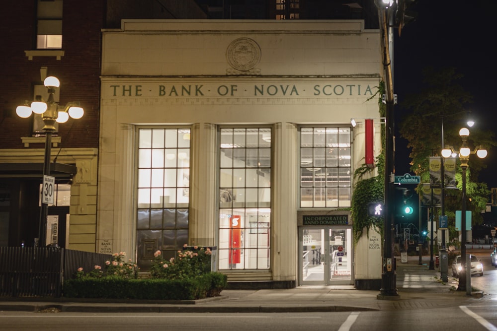 the bank of nova scotland is lit up at night