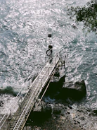 A scenic walkway over water made with pultruded PRFV panels, featuring integrated guardrails.