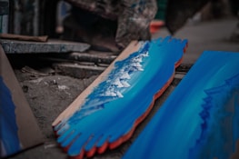 Close-up of a durable, well-crafted hardboard with ocean waves in the background.