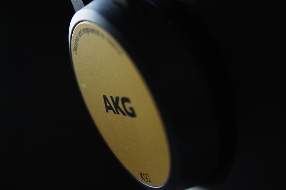 a close up of a headphone with a black background