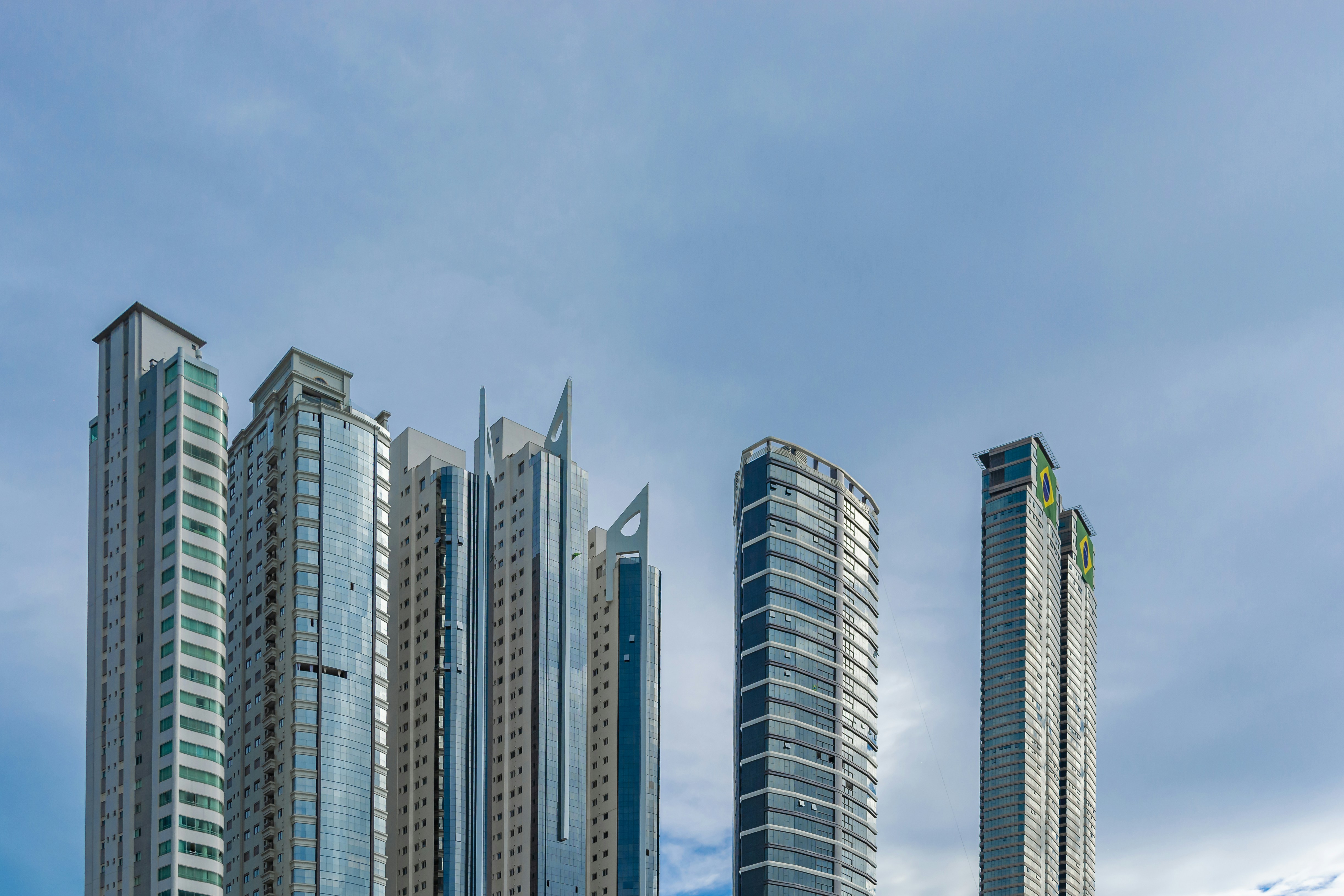 a group of tall buildings sitting next to each other