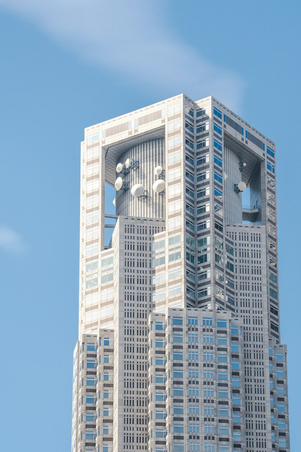 a very tall building with a clock on it's face