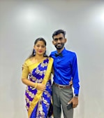 A joyful client smiling after a successful matchmaking consultation with pandit tarun attray.