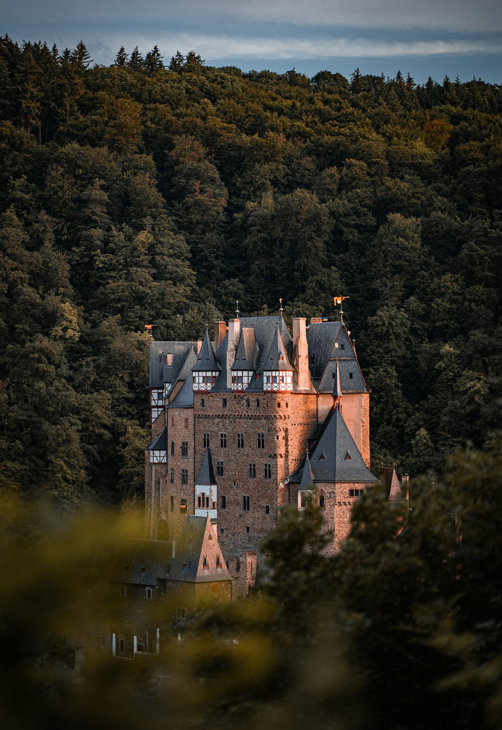 a large castle with a clock on the top of it