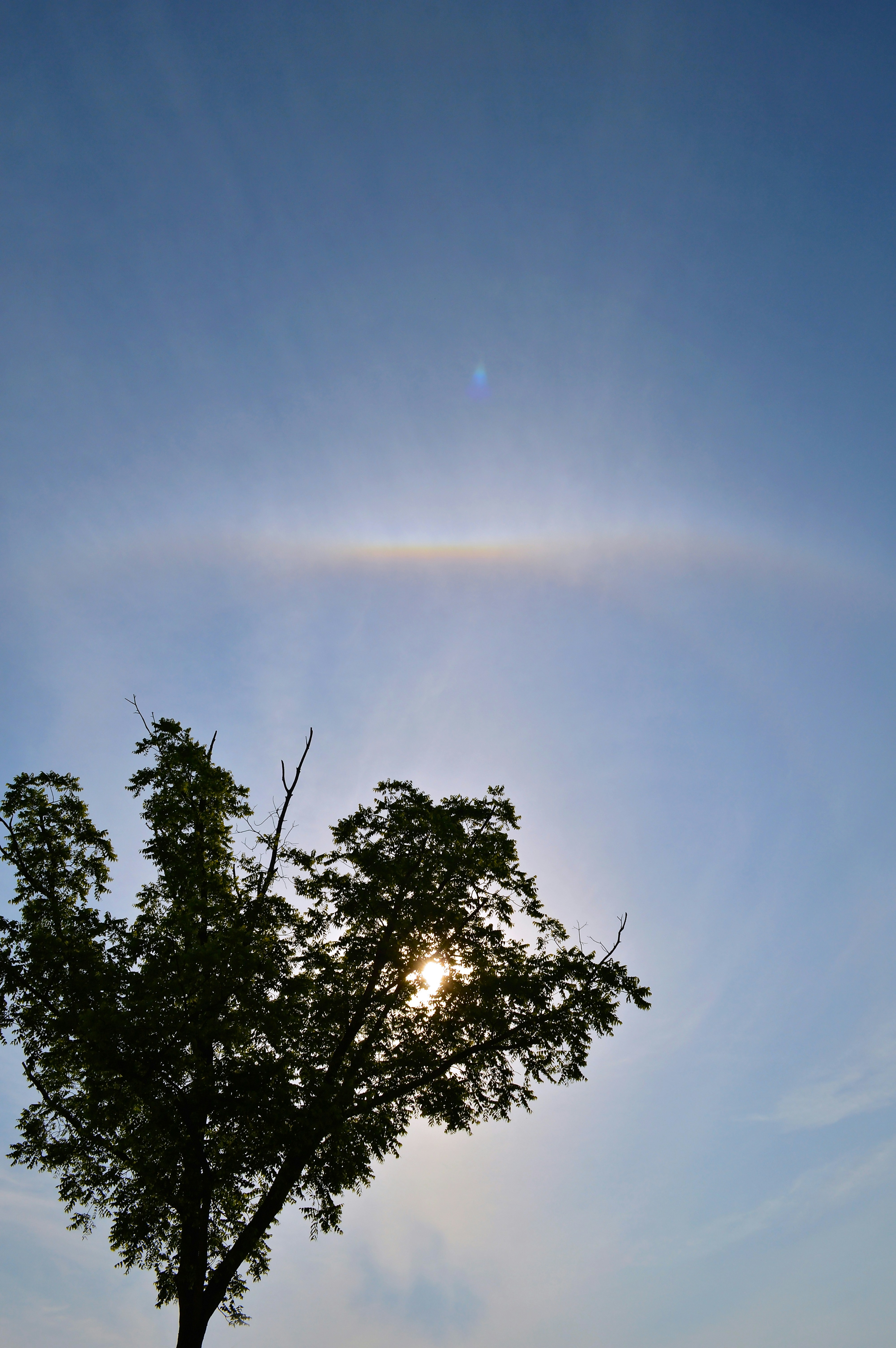 Helios incarnate with a solar flare aura.