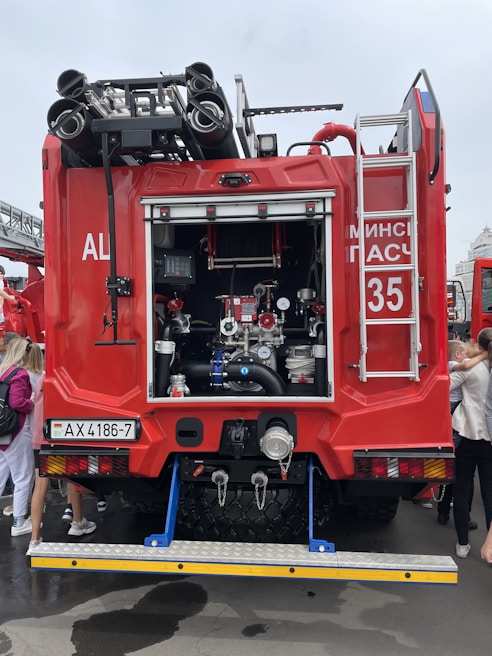 Firefighters demonstrating equipment during an open house at the station