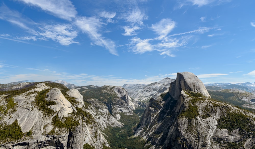 a view of the mountains from the top of a mountain