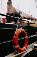 a life preserver hanging from the side of a boat