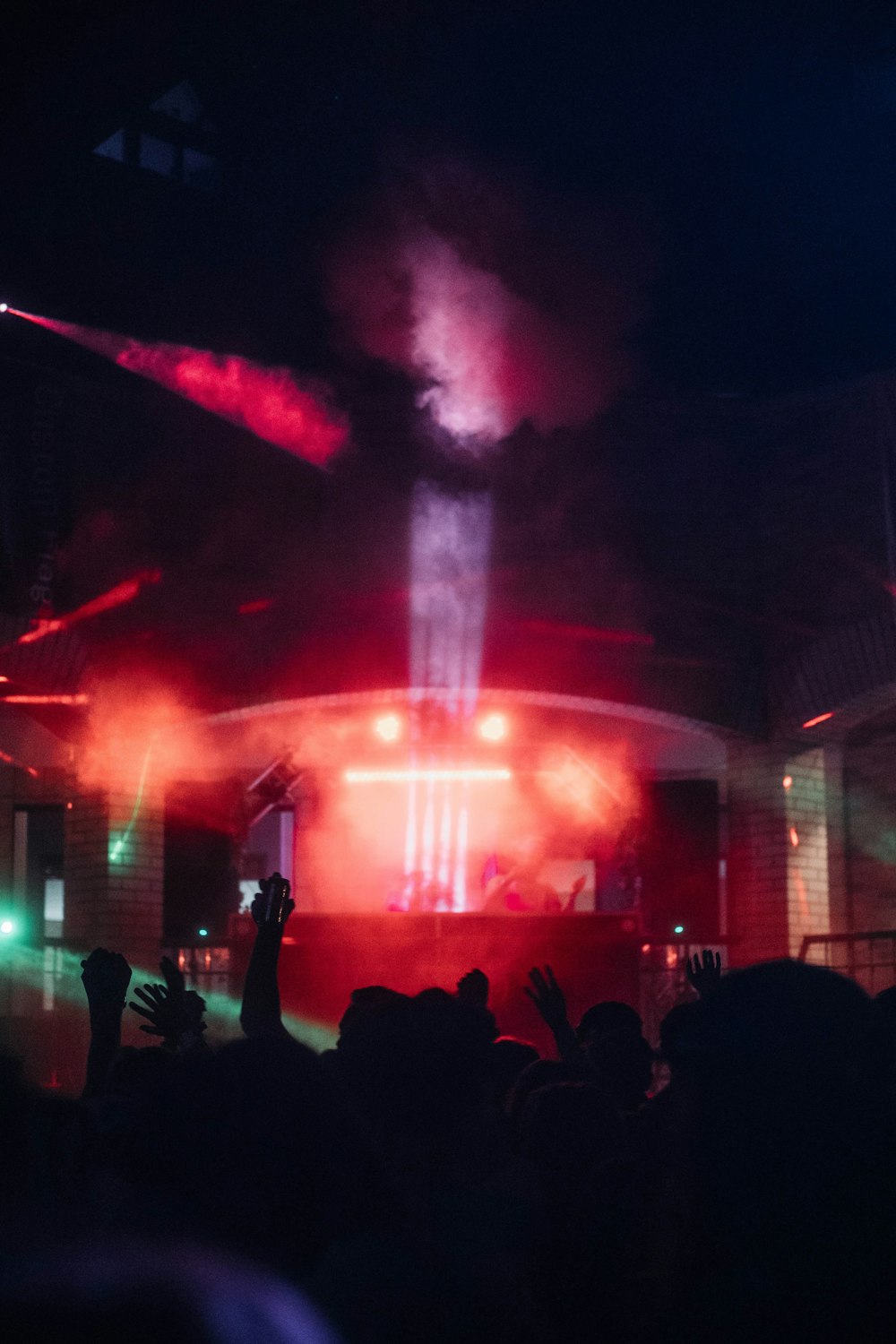 a group of people standing on top of a stage