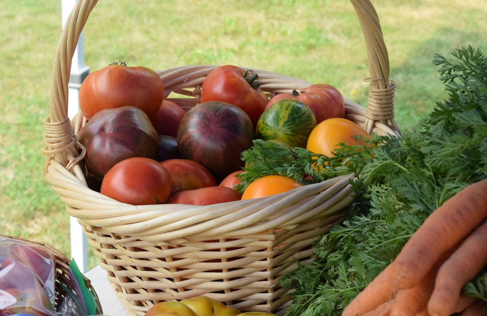 a basket filled with lots of different types of vegetables