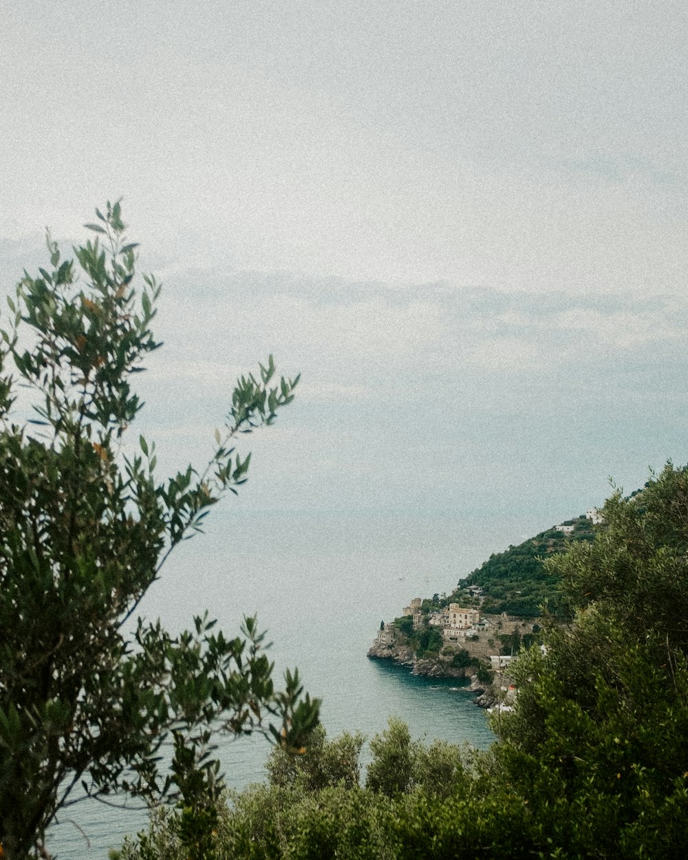 a view of a body of water from a hill