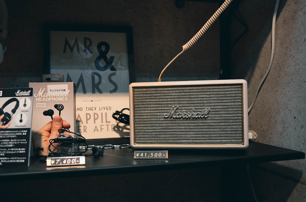 a radio sitting on top of a wooden table