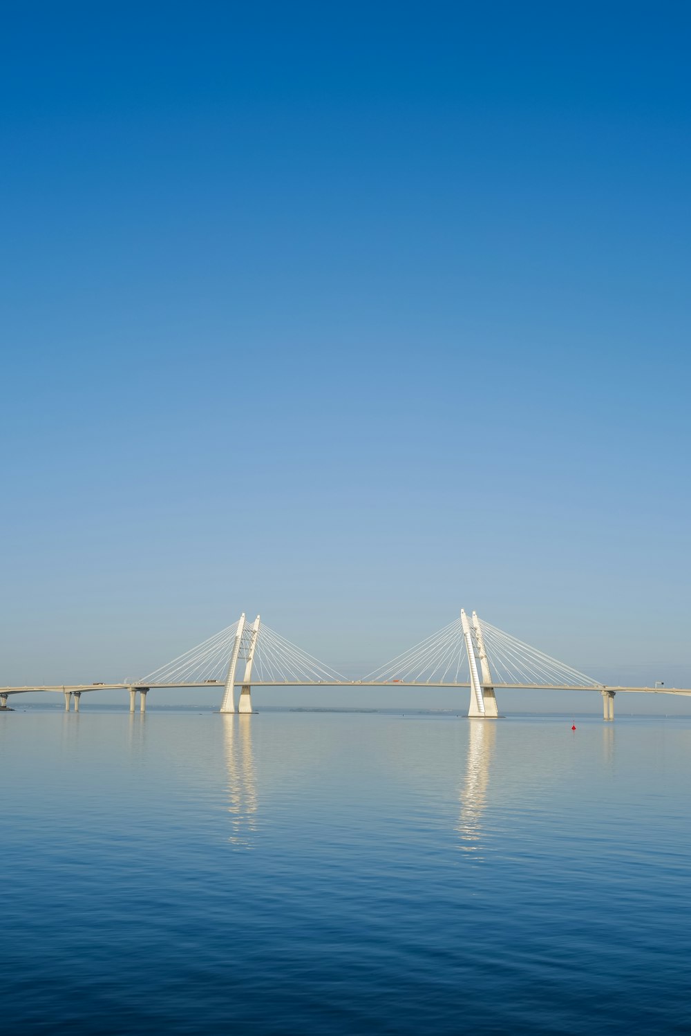 a large bridge spanning over a large body of water