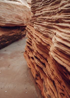 A close-up of layered rock formations revealing the mesa's ancient history.