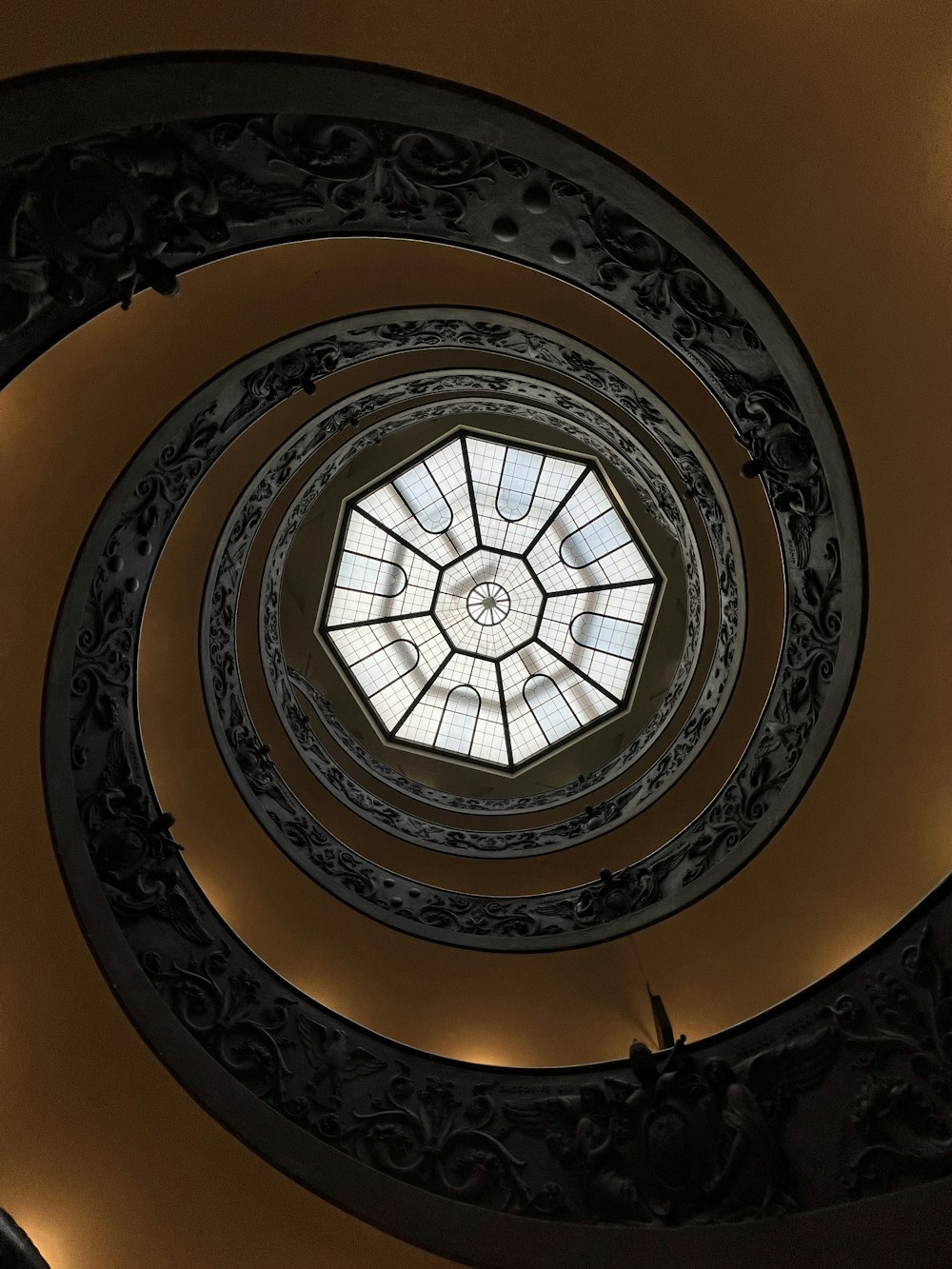 a circular ceiling with a skylight in the center