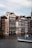 A scenic view of Amsterdam's canals with traditional houses lining the water.