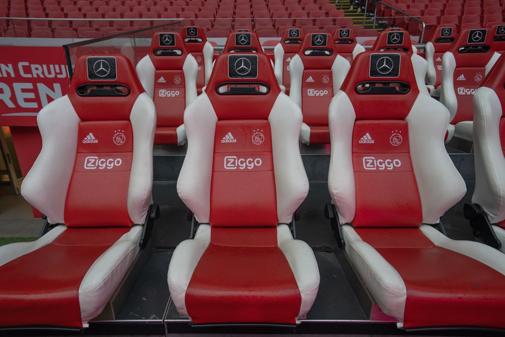 a row of seats with a logo on them