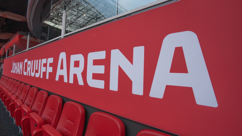 a red and white sign that says ball court arena