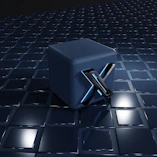 a blue cube sitting on top of a tiled floor