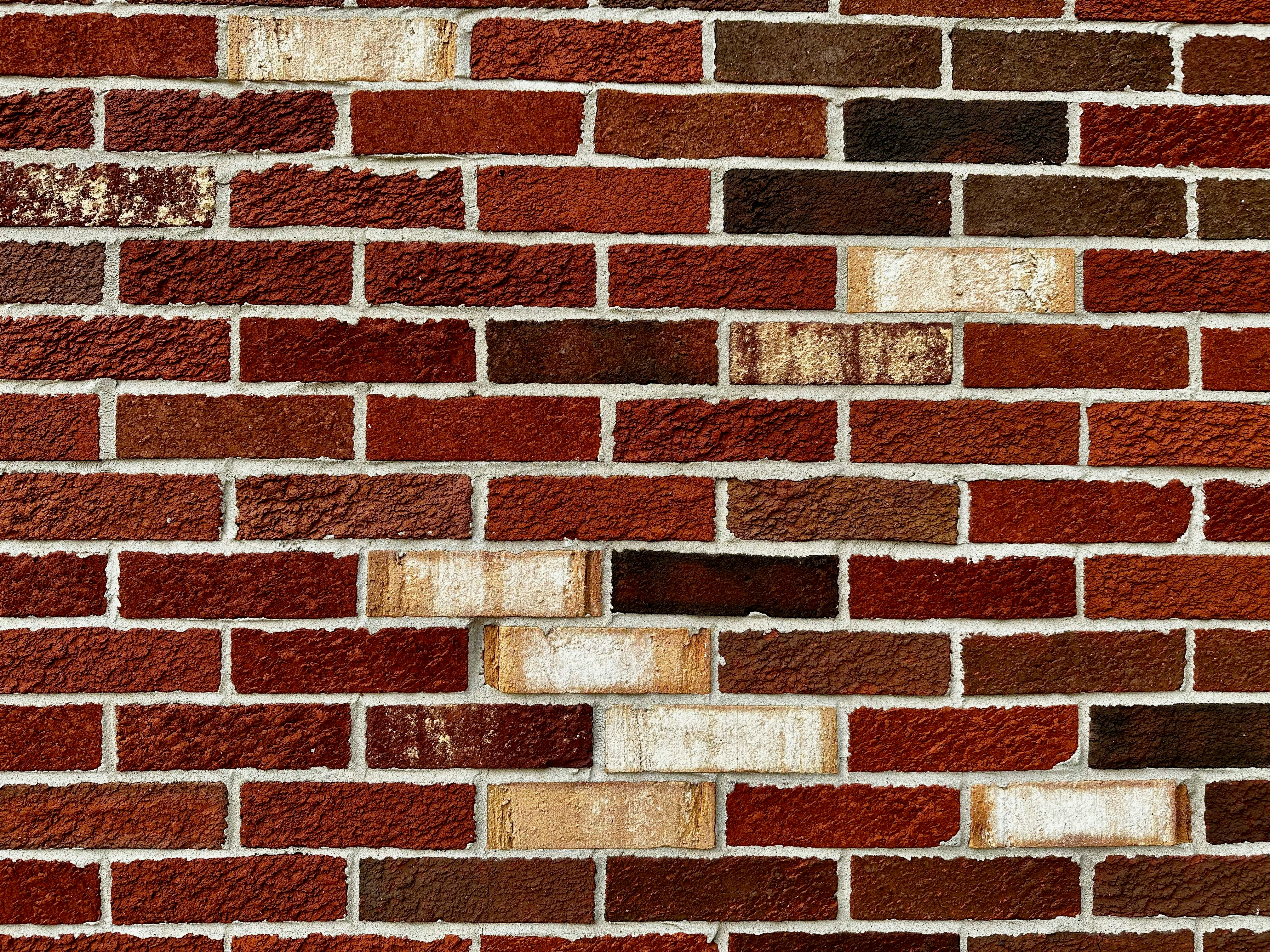 a close up of a red brick wall
