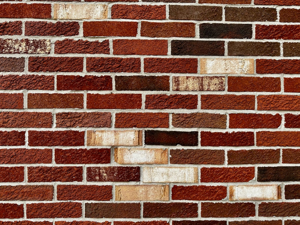 a close up of a red brick wall