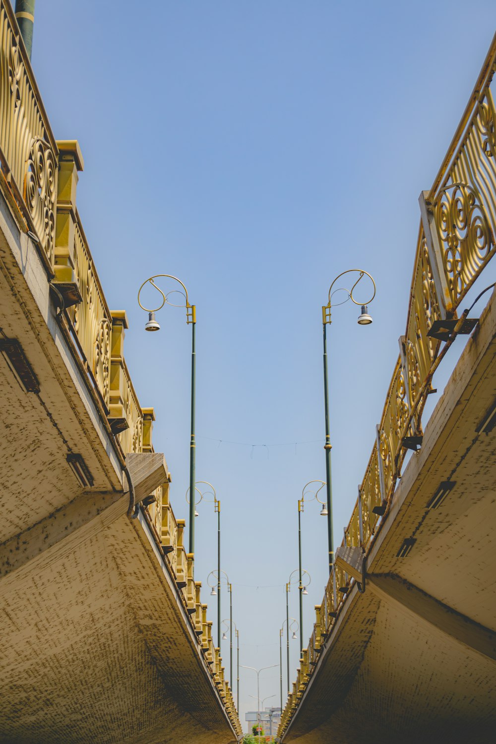 a view of a bridge from the ground