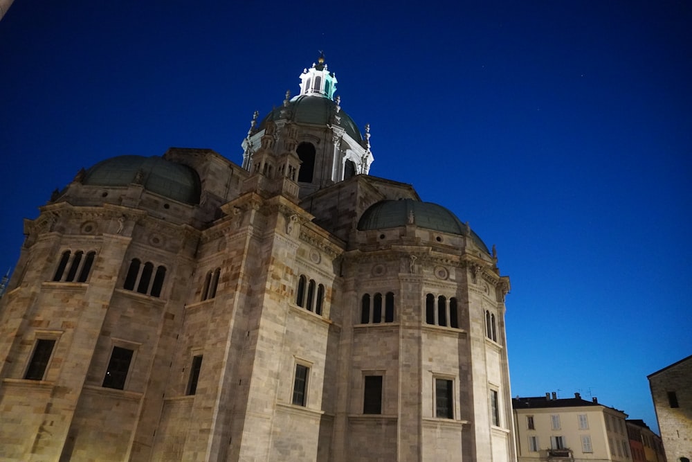 a large building with a clock on the top of it