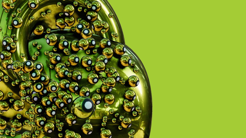 a close up of a bunch of bubbles on a green background