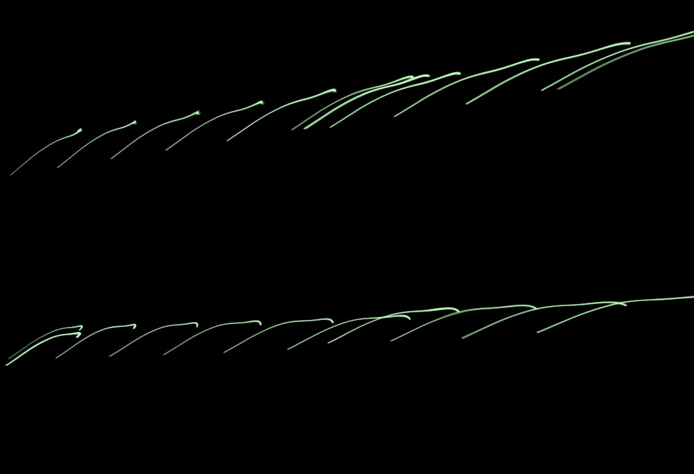 a black background with green lines on it