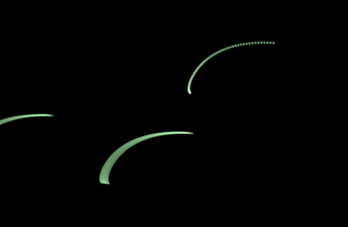 Minimalist network graph with glowing green neon nodes on space gray background