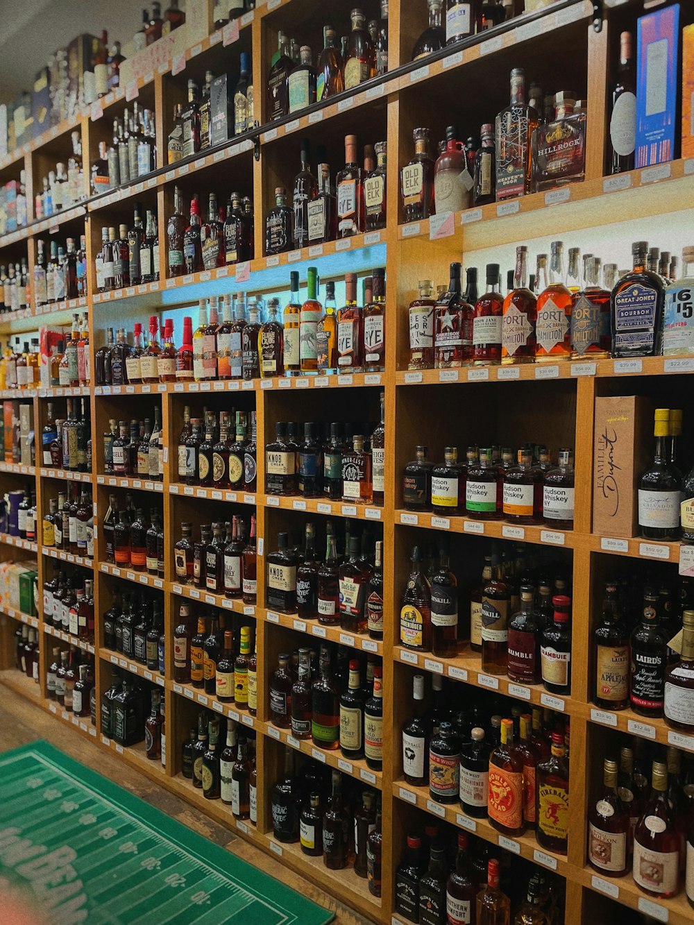 a store filled with lots of bottles of liquor