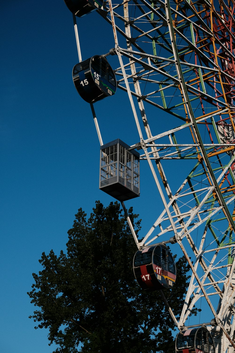 a ferris wheel with a clock on the side of it