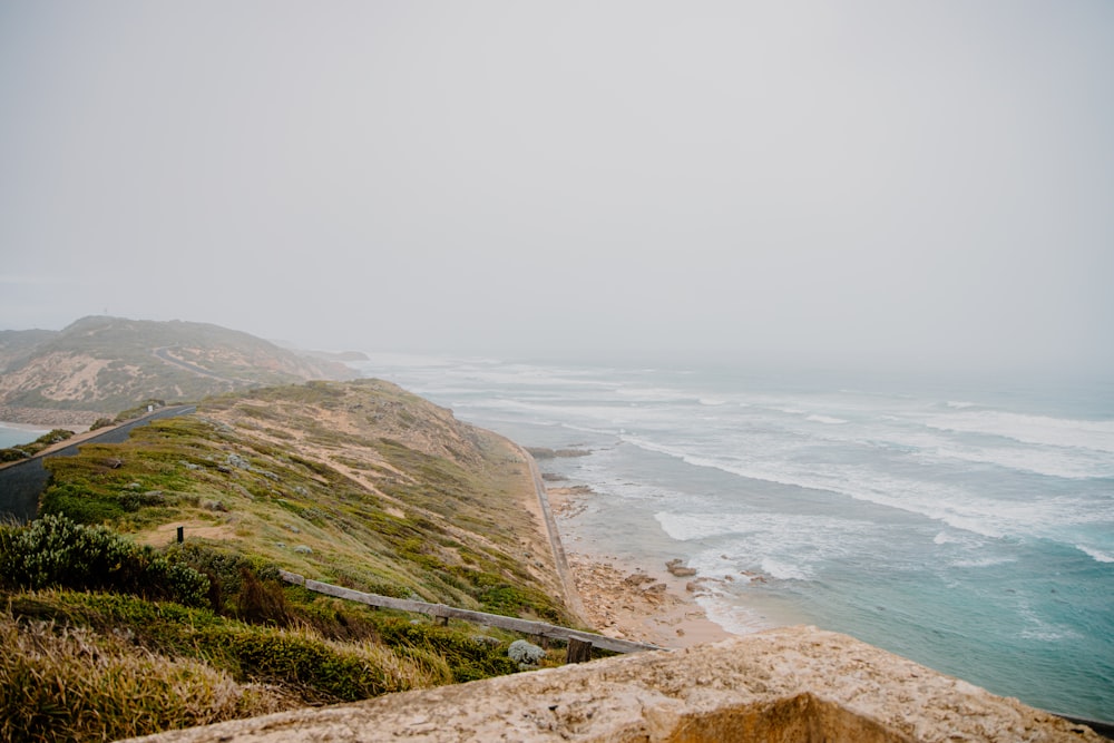 a view of the ocean from a cliff