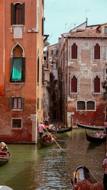 a couple of gondolas that are in the water