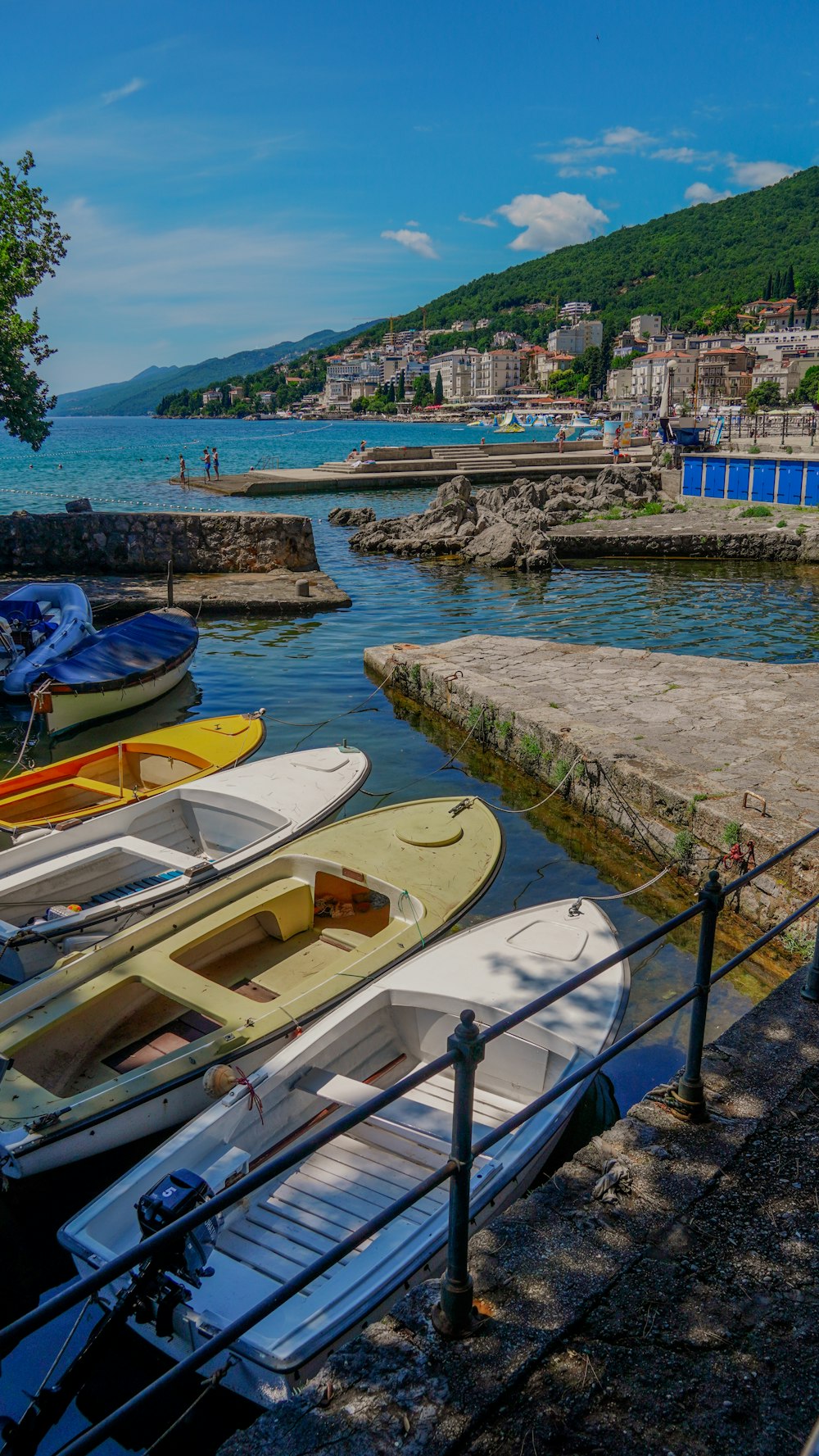 a bunch of boats that are sitting in the water