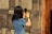a woman taking a picture of herself with her cell phone