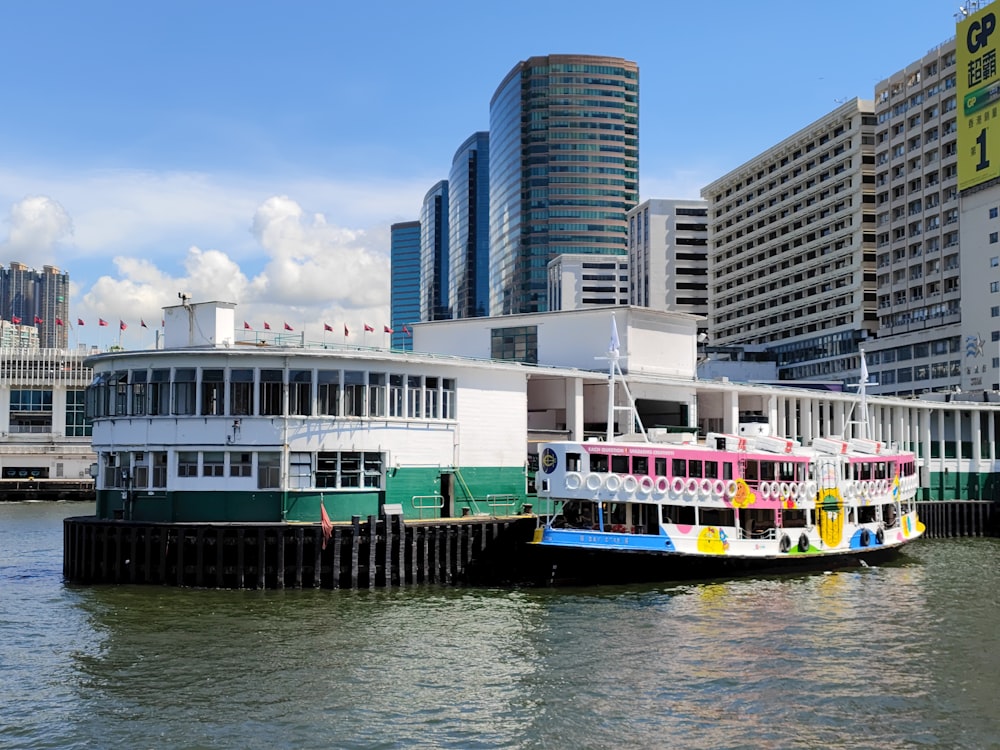 a colorful boat is docked in the water