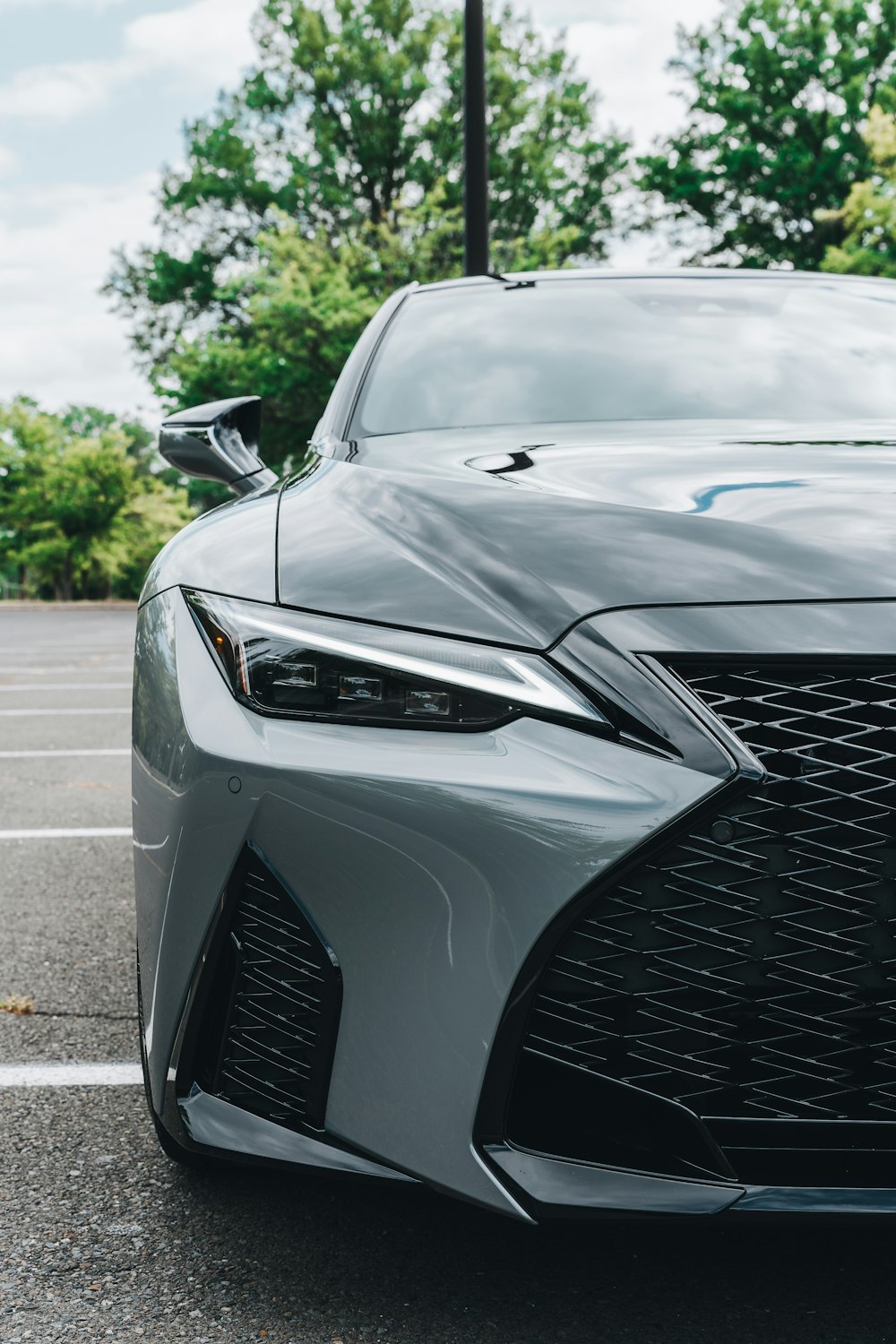 a close up of a car parked in a parking lot