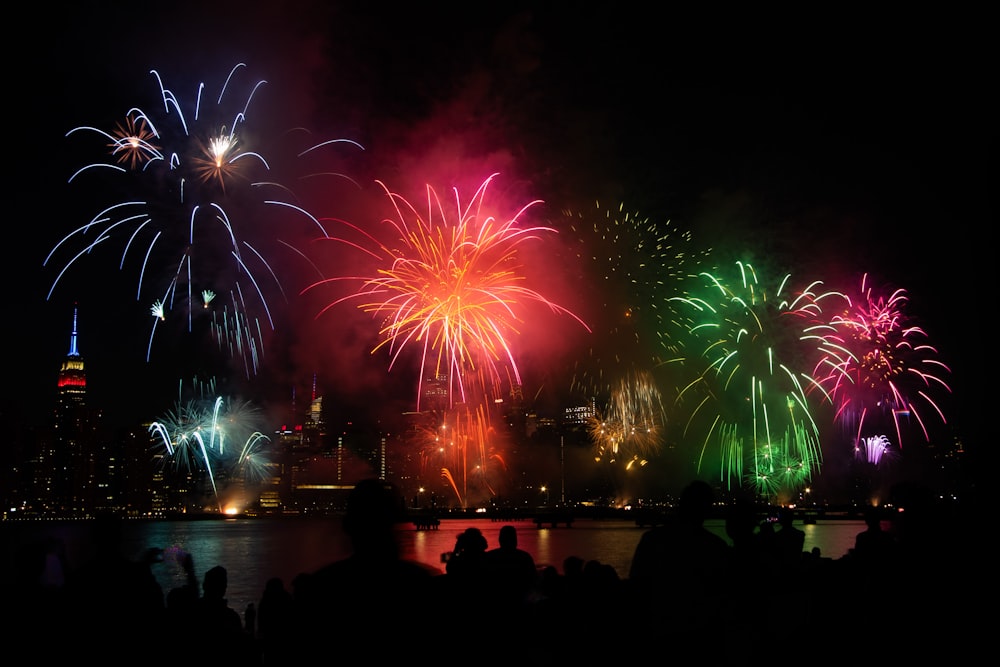 a group of people watching a fireworks display