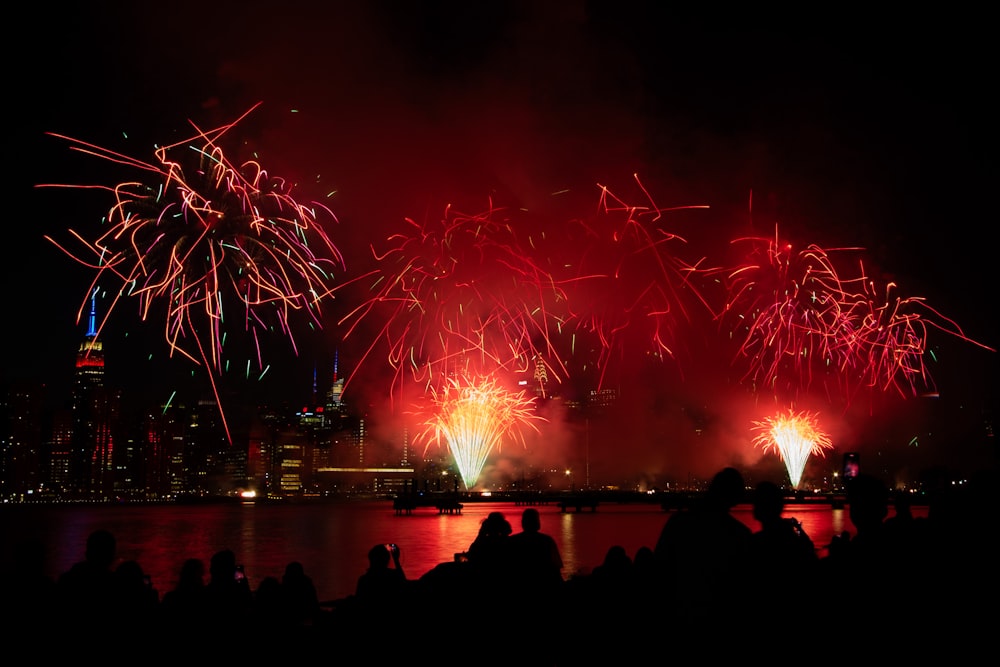 a group of people watching a fireworks display