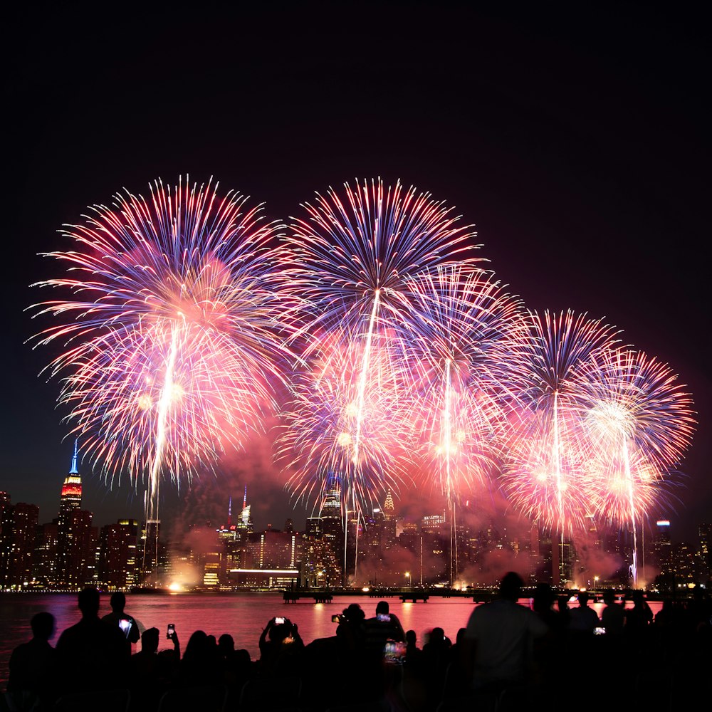 a group of people watching a fireworks display