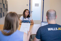 Professional lawyers discussing documents in a bright meeting room