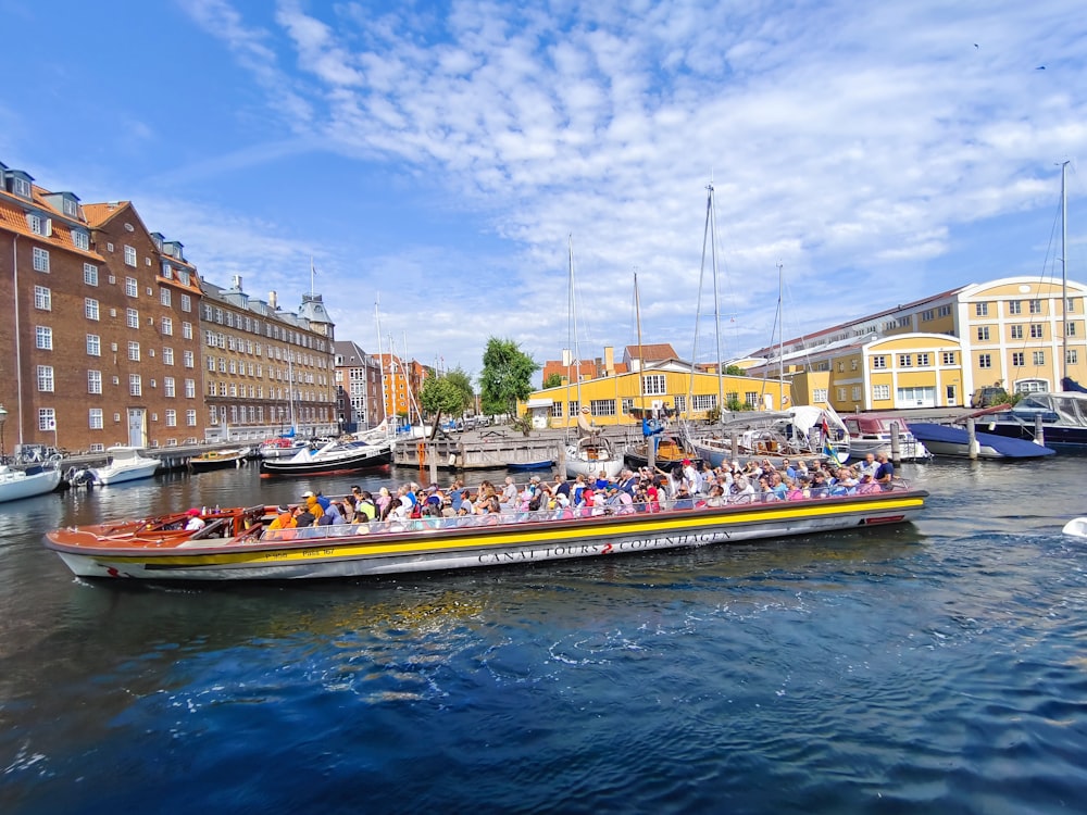 a boat full of people on a body of water