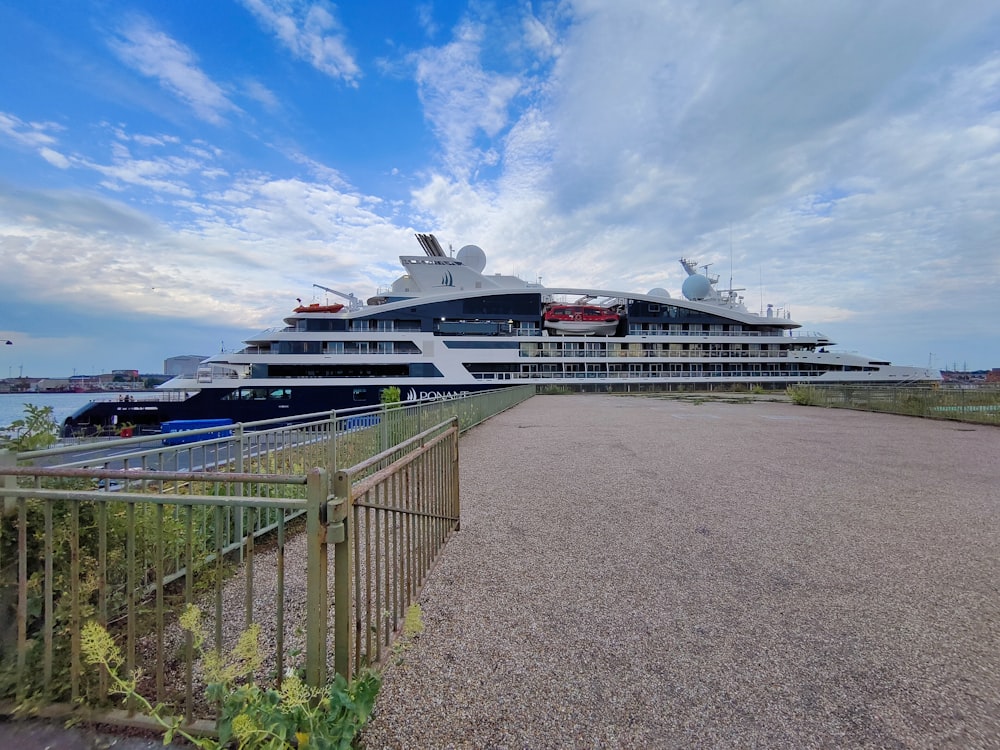 a large cruise ship docked in a harbor