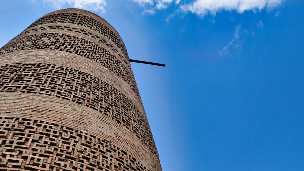 a tall brick structure with a sky background